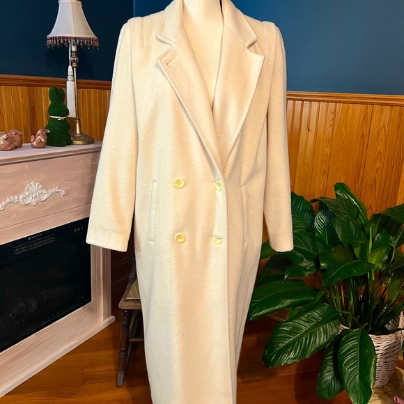 Jackets & Blazers - This is a white/cream wool vintage, long coat. Size 5/6.